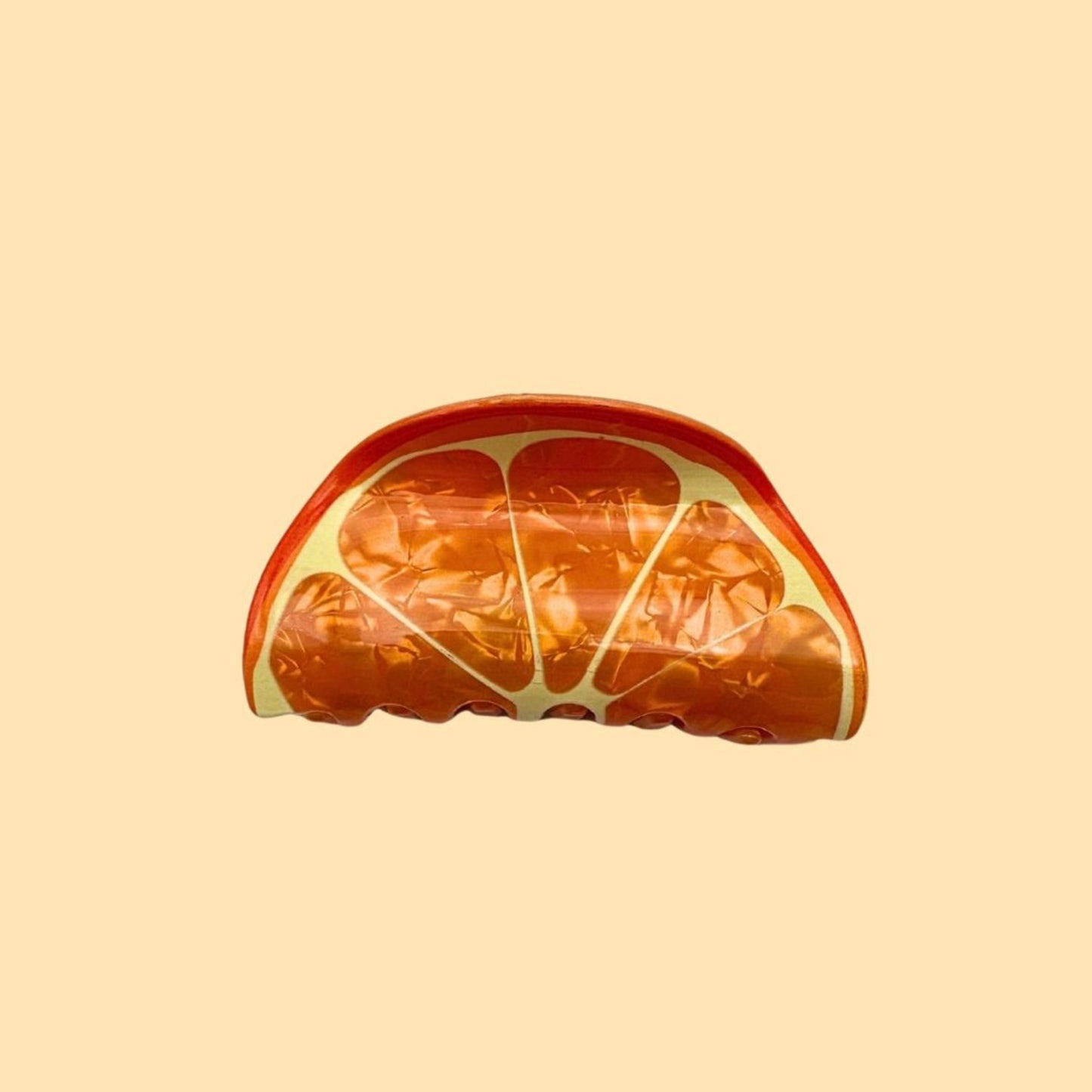 PINCE À CHEVEUX ORANGE