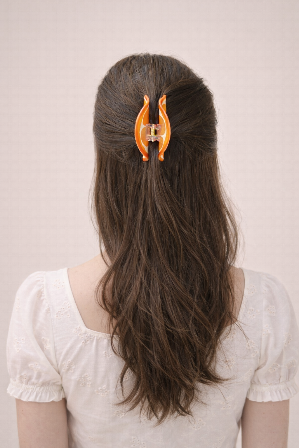 PINCE À CHEVEUX ORANGE