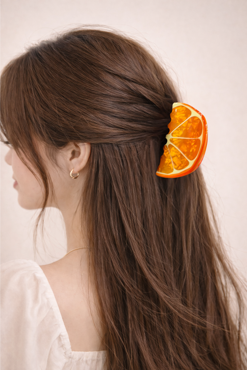 PINCE À CHEVEUX ORANGE
